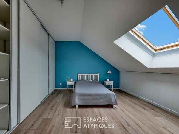 La maison meulière à la rénovation contemporaine avec atelier et jardin
