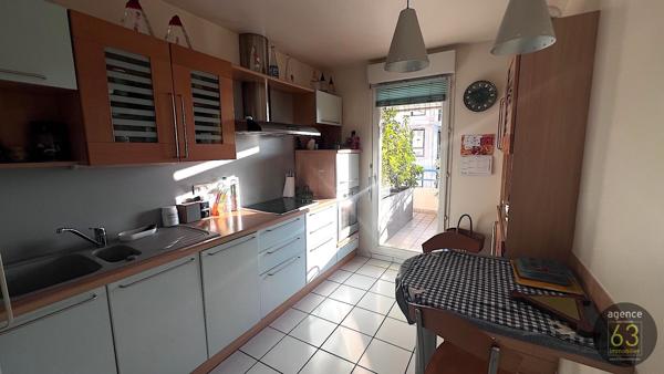Beau et lumineux T4 de 99 m2, ascenseur, 38 m2 de terrasses, garage de 18 m2, copropriété de standing