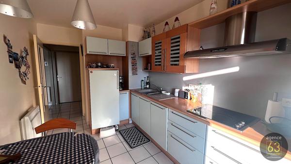 Beau et lumineux T4 de 99 m2, ascenseur, 38 m2 de terrasses, garage de 18 m2, copropriété de standing