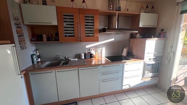 Beau et lumineux T4 de 99 m2, ascenseur, 38 m2 de terrasses, garage de 18 m2, copropriété de standing