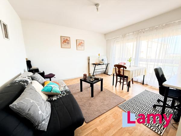 Appartement + cave + stationnement extérieur