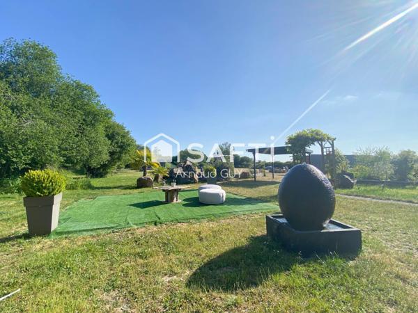 LOFT avec dépendances et beau terrain !