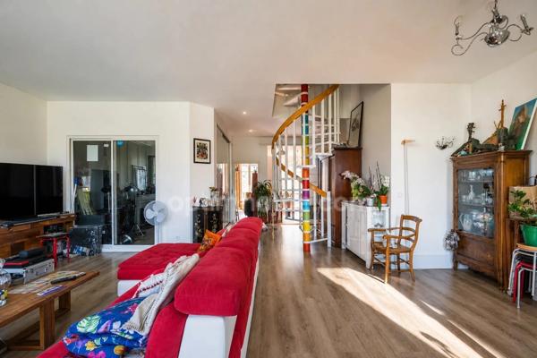 Lyon 7ᵉ – Duplex haussmannien avec vue panoramique
