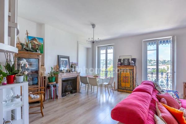 Lyon 7ᵉ – Duplex haussmannien avec vue panoramique