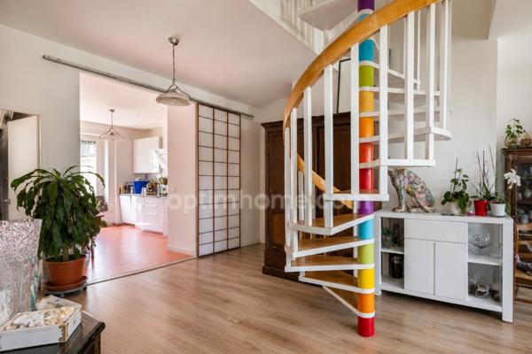 Lyon 7ᵉ – Duplex haussmannien avec vue panoramique