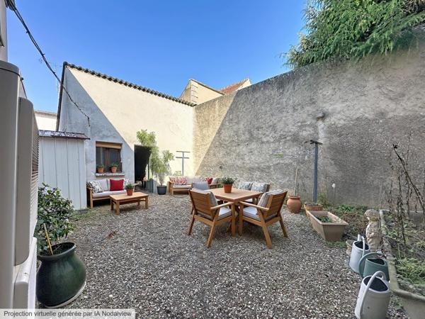 Plein centre ville avec garage et bon DPE