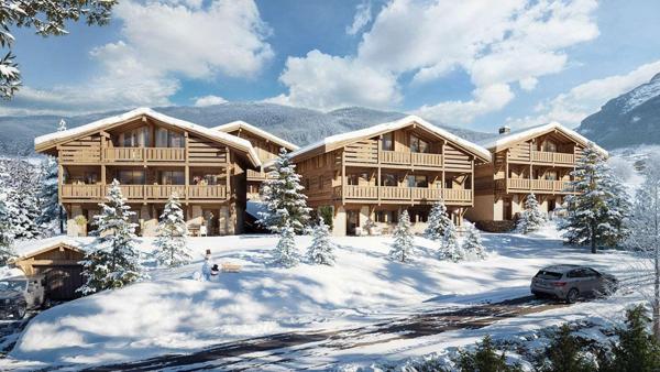 Duplex en dernier étage avec balcons dans un chalet haut-de-gamme