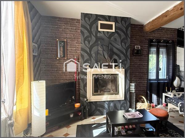 A Soissons, quartier prisé, maison de ville en pierre 6 P. avec 4 chambres, garage et sous-sol sur son terrain de 237 m2.