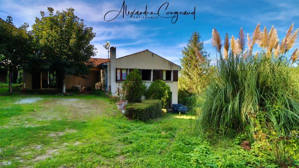 Dourgne - A vendre maison de plain-pied de 118 m² avec 4 chambres, sous-sol et terrain de 3000 m²