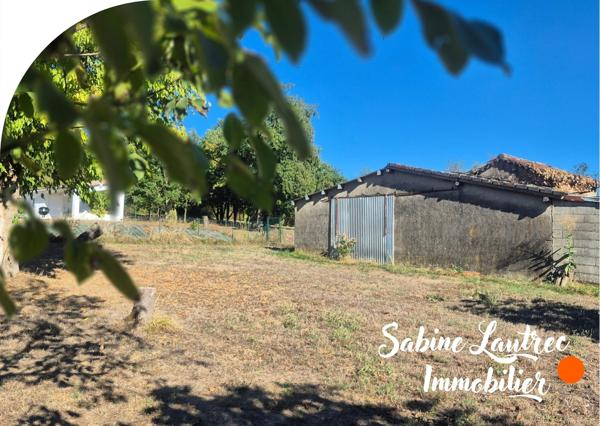 Terrain constructible + local existant
