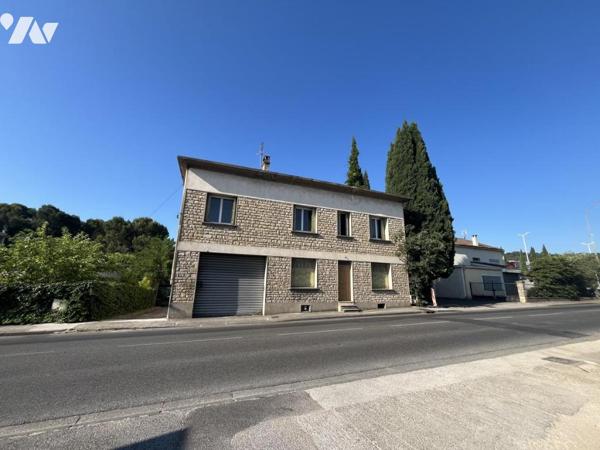 Ensemble de deux logements avec garage, cave et jardin de 633 m²