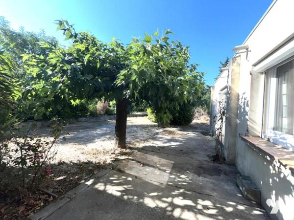 Ensemble de deux logements avec garage, cave et jardin de 633 m²