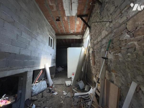 Ensemble de deux logements avec garage, cave et jardin de 633 m²