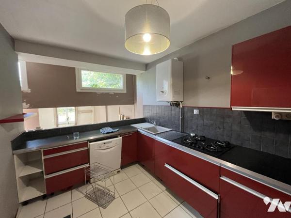 Ensemble de deux logements avec garage, cave et jardin de 633 m²