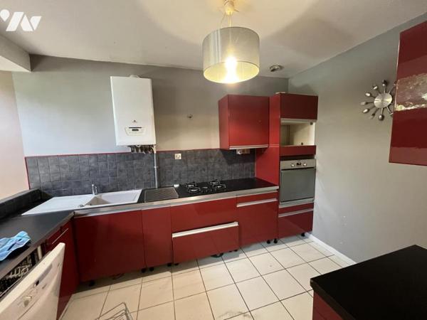 Ensemble de deux logements avec garage, cave et jardin de 633 m²