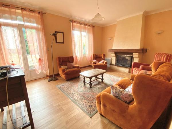 maison familiale avec garage et jardin attenant