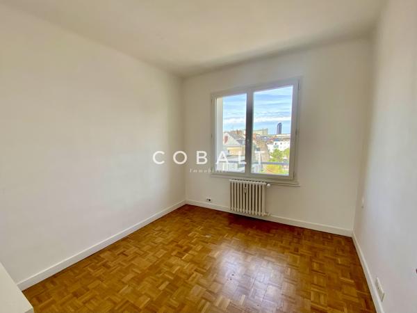 Appartement T4 spacieux avec balcon & vue dégagée