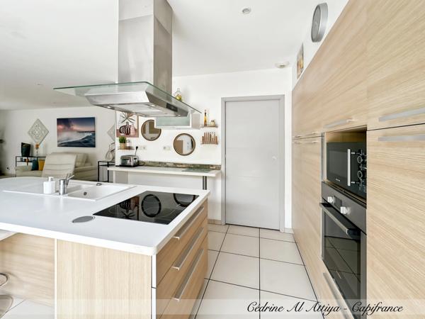 Maison à vendre Périgny, quartier Rompsay, 119m2, plain-pied, garage, jardin, véranda avec jacuzzi