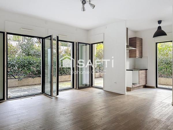 REZ DE JARDIN AVEC TERRASSE PRIVATIVE - CALME