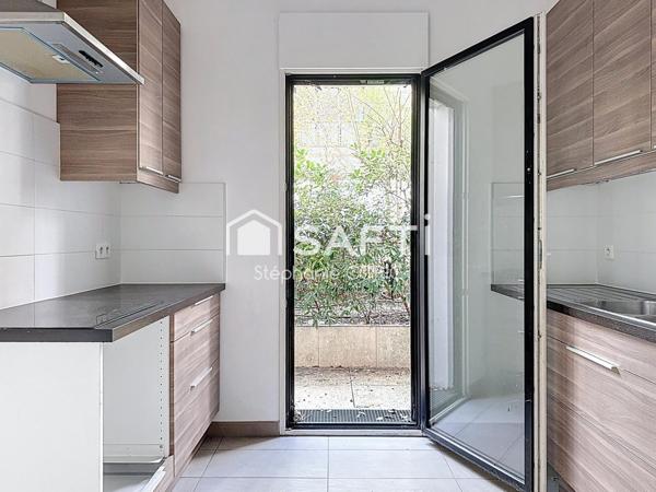 REZ DE JARDIN AVEC TERRASSE PRIVATIVE - CALME