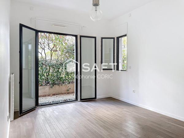 REZ DE JARDIN AVEC TERRASSE PRIVATIVE - CALME