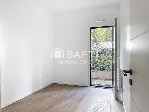 REZ DE JARDIN AVEC TERRASSE PRIVATIVE - CALME