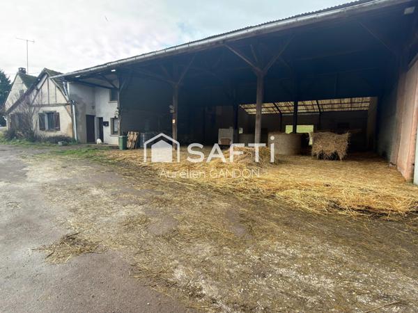 Maison avec 25HA de terrain et 40 box à chevaux