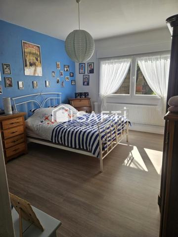 Appartement 2 chambres,jardin,2 caves