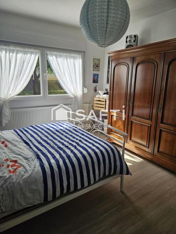 Appartement 2 chambres,jardin,2 caves