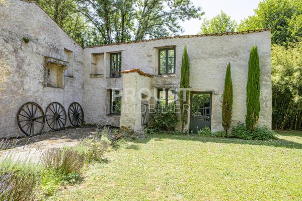 En exclusivité Magnifique propriété dans un cadre exceptionnel, à 10 minutes d'une gare TGV.