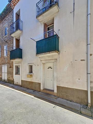 Maison de ville 3 chambres au cœur de Bédarieux – Bon état général avec balcons et buanderie
