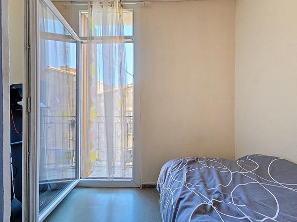 Maison de ville 3 chambres au cœur de Bédarieux – Bon état général avec balcons et buanderie