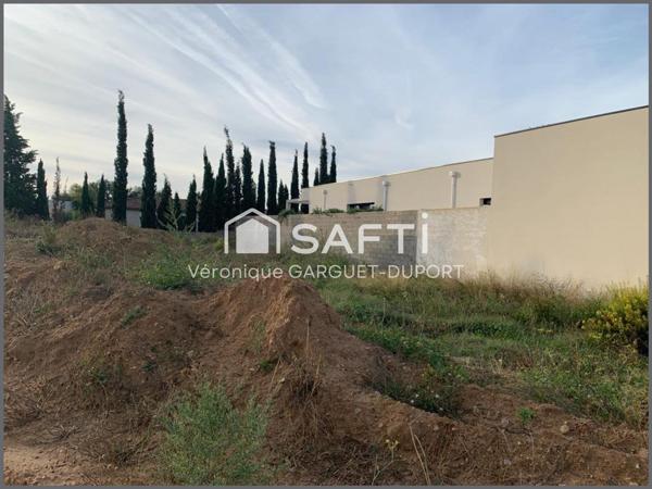 Grand terrain plat constructible, quartier recherché