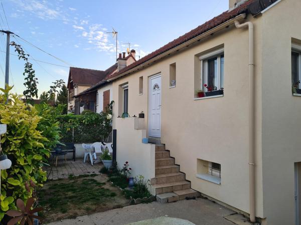 Charmante maison avec jardin et garage