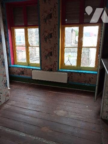 A VENDRE maison au centre de Bourbourg comprenant 3 chambres, séjour, cuisine, cave, cour extér...