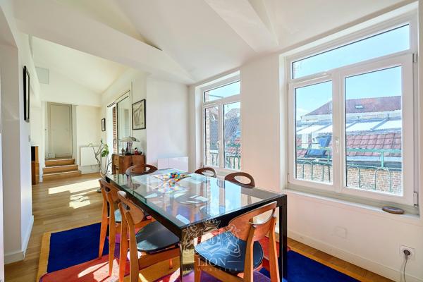 Superbe appartement avec terrasse, parking possible.