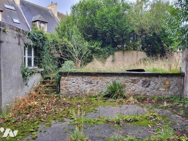 AUNAY SUR ODON Immeuble de rapport