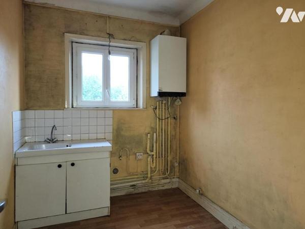 AUNAY SUR ODON Immeuble de rapport