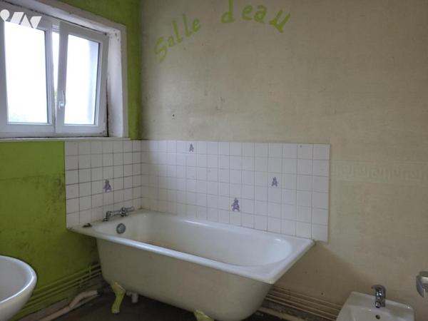 AUNAY SUR ODON Immeuble de rapport