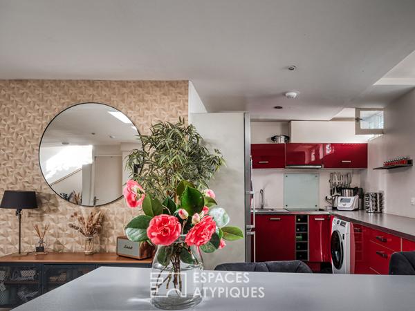 Maison esprit loft en souplex avec jardin d’hiver et extérieur.