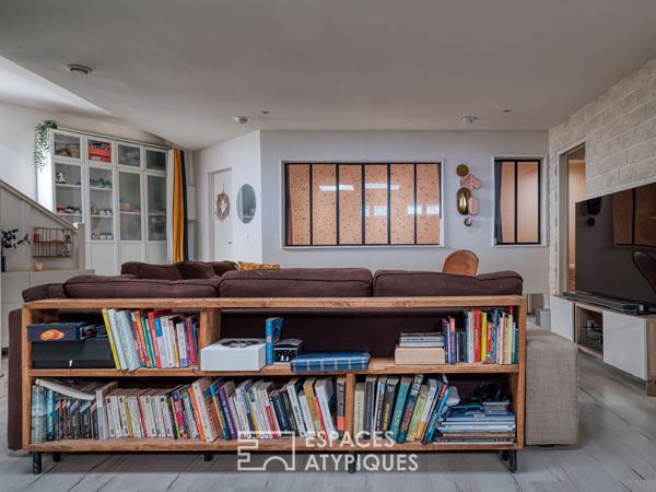 Maison esprit loft en souplex avec jardin d’hiver et extérieur.