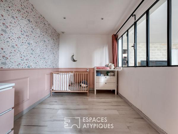 Maison esprit loft en souplex avec jardin d’hiver et extérieur.