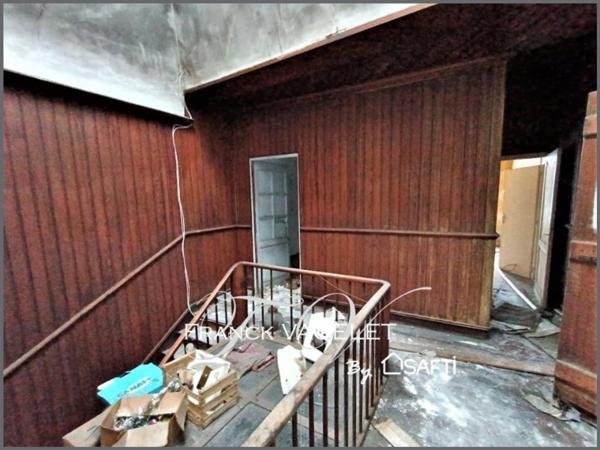 Énorme potentiel pour cet immeuble à rénover