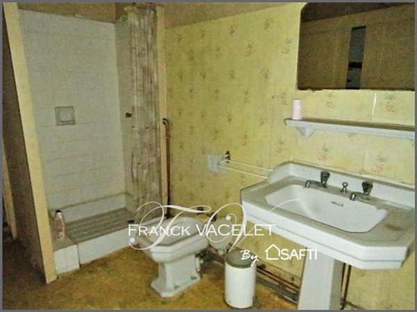 Énorme potentiel pour cet immeuble à rénover