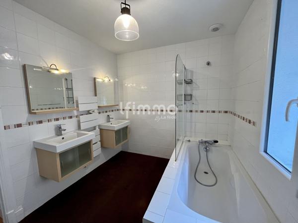 Maison avec sous-sol complet et ancienne minoterie