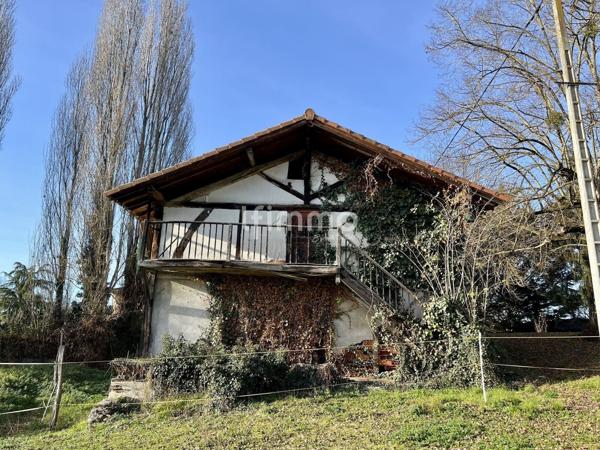 Maison avec sous-sol complet et ancienne minoterie
