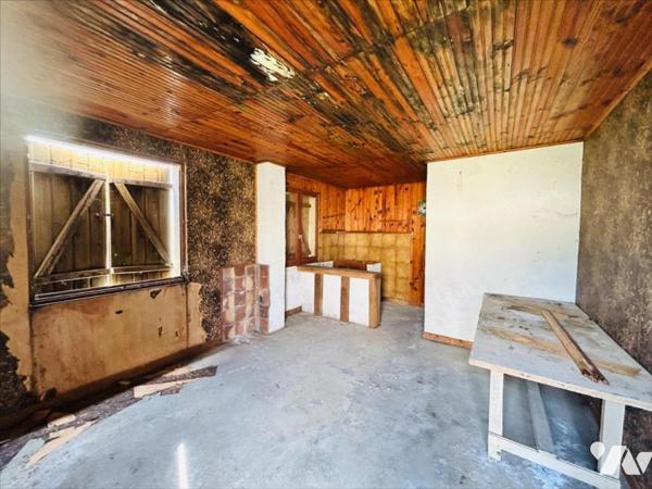 TERRAIN AVEC BATIMENT A RENOVER