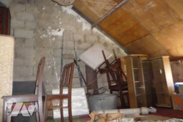 Une maison à usage d'habitation proche de tous commerces.