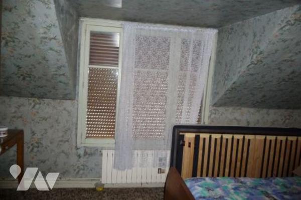 Une maison à usage d'habitation proche de tous commerces.