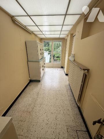 Ensemble immobilier composé de deux maisons et de deux garages